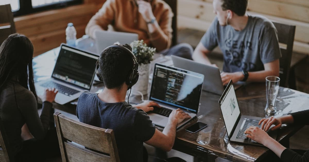 Search Roost editorial team collaborating on AI SEO tool research and reviews