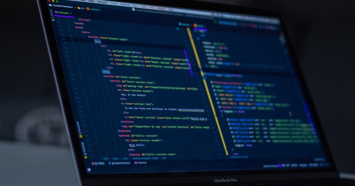 Code editor showing AI-generated HTML and CSS for responsive web design components