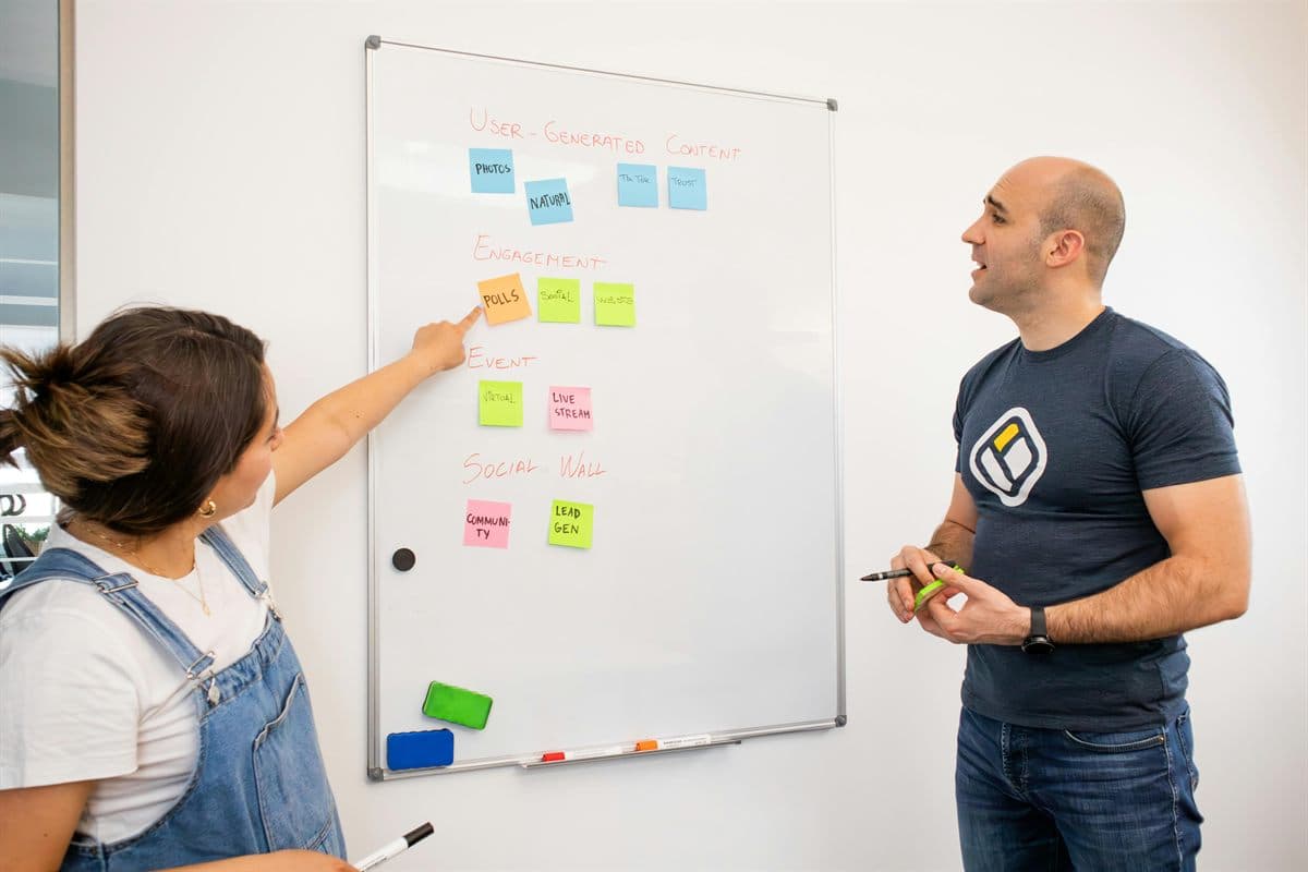 Team whiteboard session planning a claude searchbot robots.txt policy for separate Anthropic crawler access