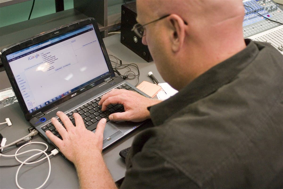 Laptop showing Google search results used to study google ai overviews ranking factors