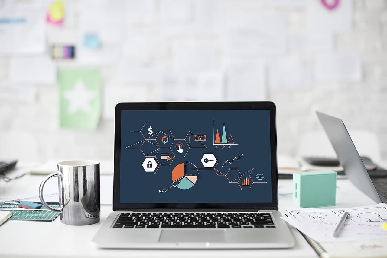 Laptop with analytics charts representing perplexity referral traffic in ga4 reporting