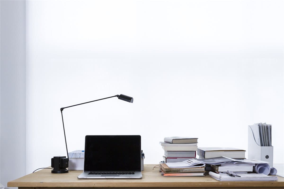 Laptop desk workspace reviewing perplexitybot robots.txt logs and citation monitoring